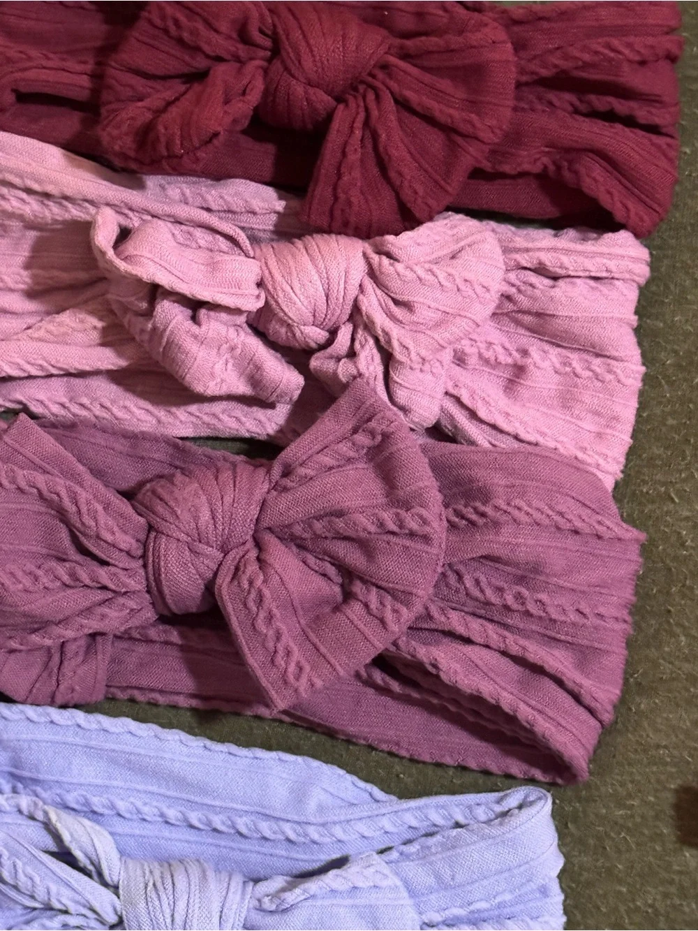 Cable knit (10) bows - purples and pinks/reds USED